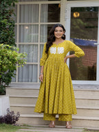 Mustard Pure Cotton Printed Embroidered Round Neck 3/4 Sleeves Calf Length Flared Kurta Pant And Dupatta Set Mizazjaipur