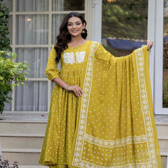 Mustard Pure Cotton Printed Embroidered Round Neck 3/4 Sleeves Calf Length Flared Kurta Pant And Dupatta Set Mizazjaipur