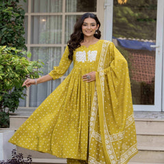 Mustard Pure Cotton Printed Embroidered Round Neck 3/4 Sleeves Calf Length Flared Kurta Pant And Dupatta Set Mizazjaipur