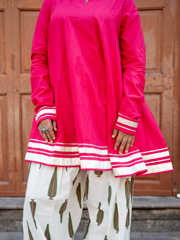 (Pre-order) Hot Pink Pure Cotton Solid Round Neck Full Sleeves Hip Length Flared Kurta Farshi Salwar Set