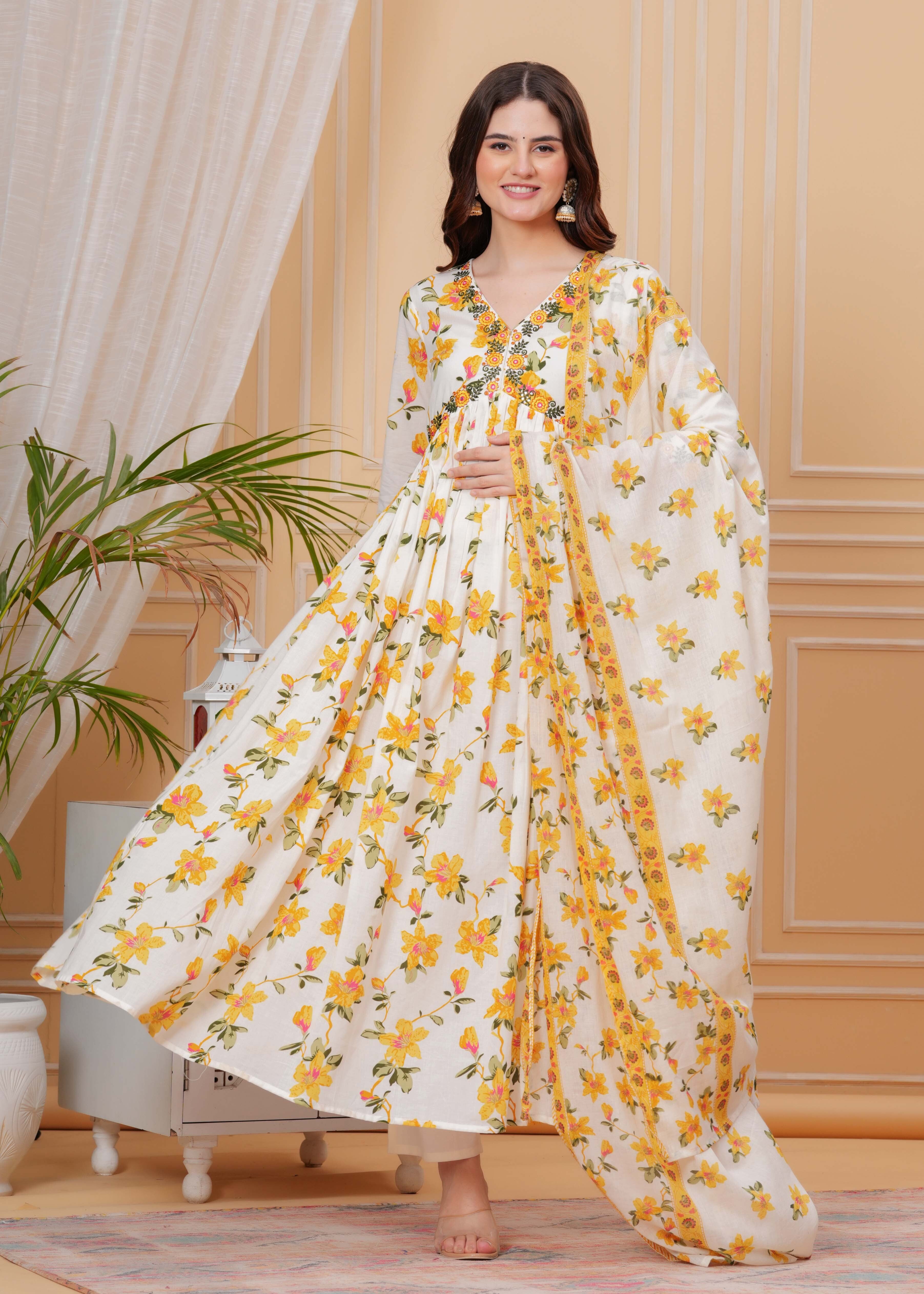 Mustard Pure Cotton Floral V Neck Flared Kurta, Pant & Dupatta Set For Women Mizaz Jaipur