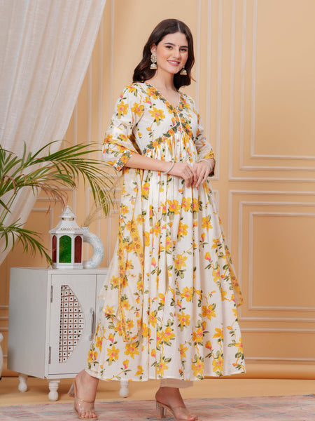 Mustard Pure Cotton Floral V Neck Flared Kurta, Pant & Dupatta Set For Women Mizaz Jaipur