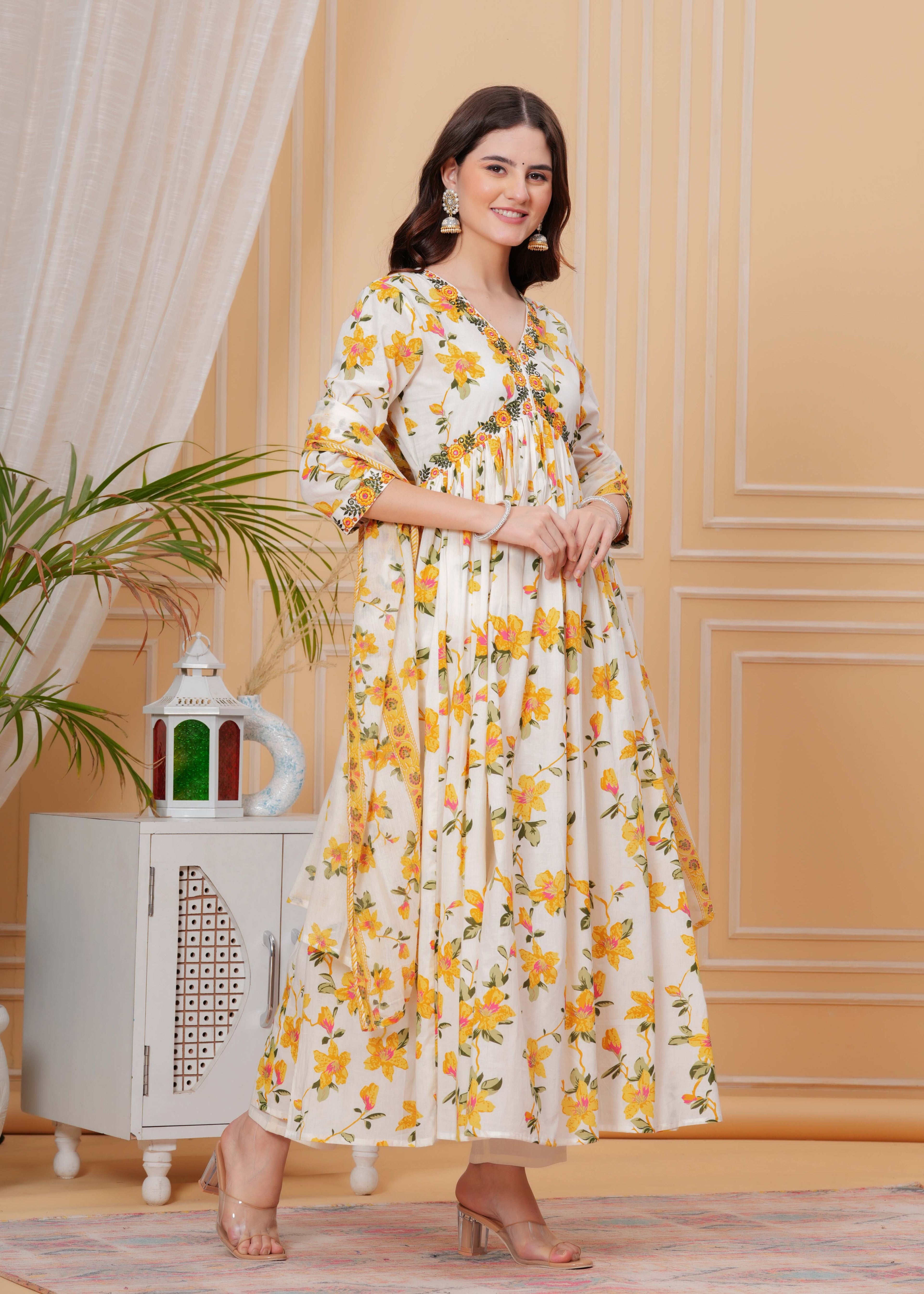 Mustard Pure Cotton Floral V Neck Flared Kurta, Pant & Dupatta Set For Women Mizaz Jaipur
